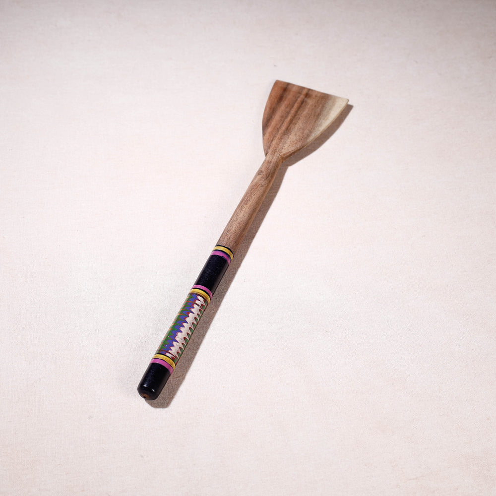 lacquered wooden spatula