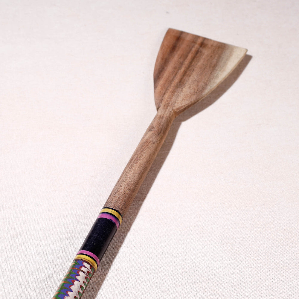 lacquered wooden spatula