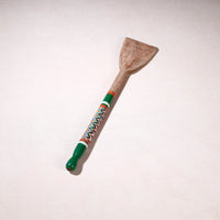 lacquered wooden spatula