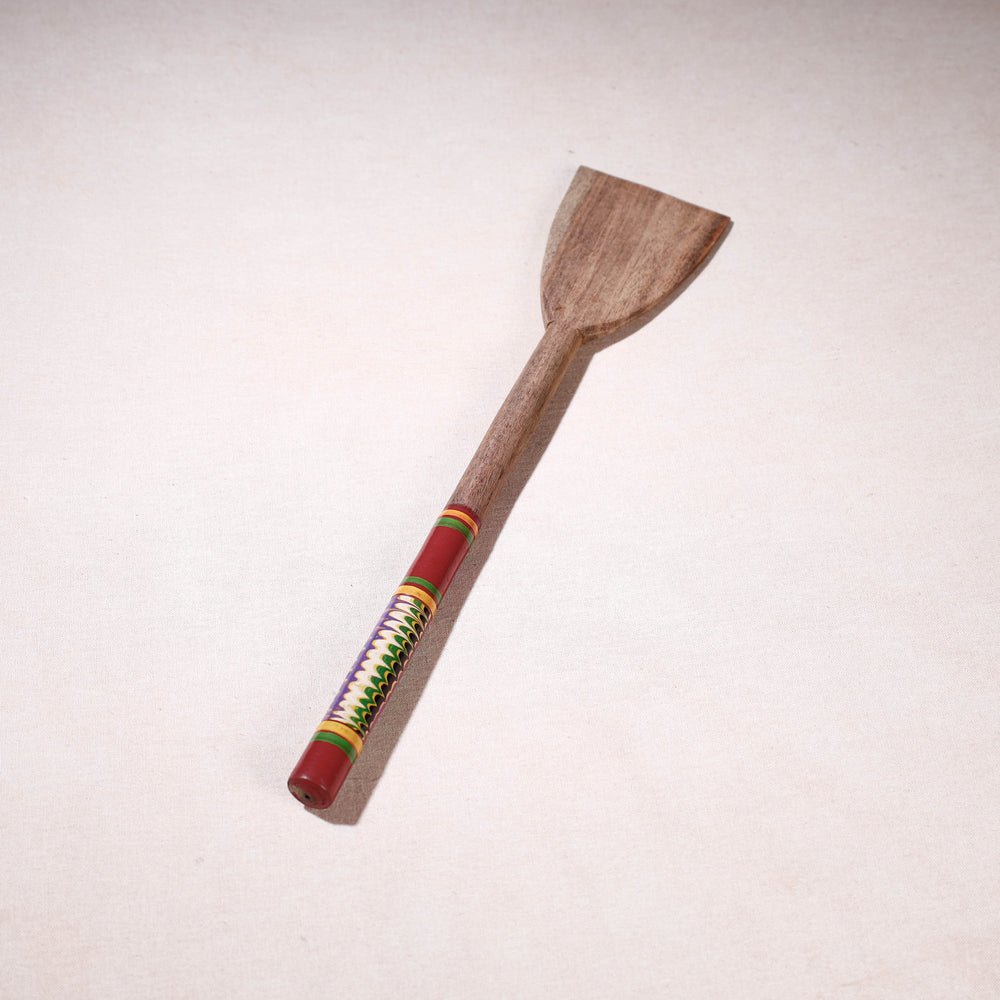 lacquered wooden spatula