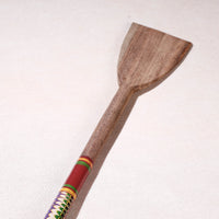 lacquered wooden spatula