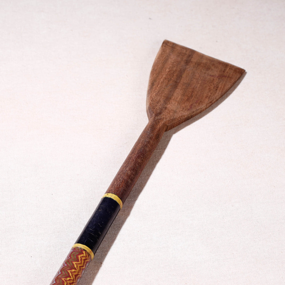 lacquered wooden spatula