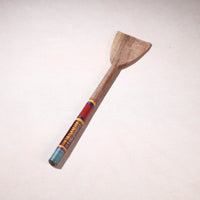 lacquered wooden spatula