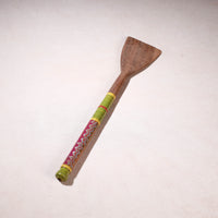 lacquered wooden spatula