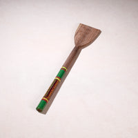 lacquered wooden spatula