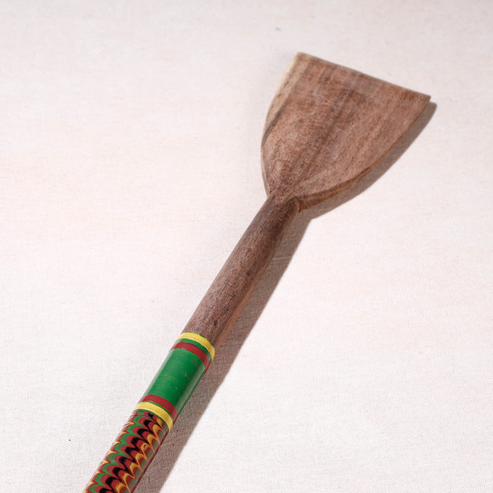 lacquered wooden spatula