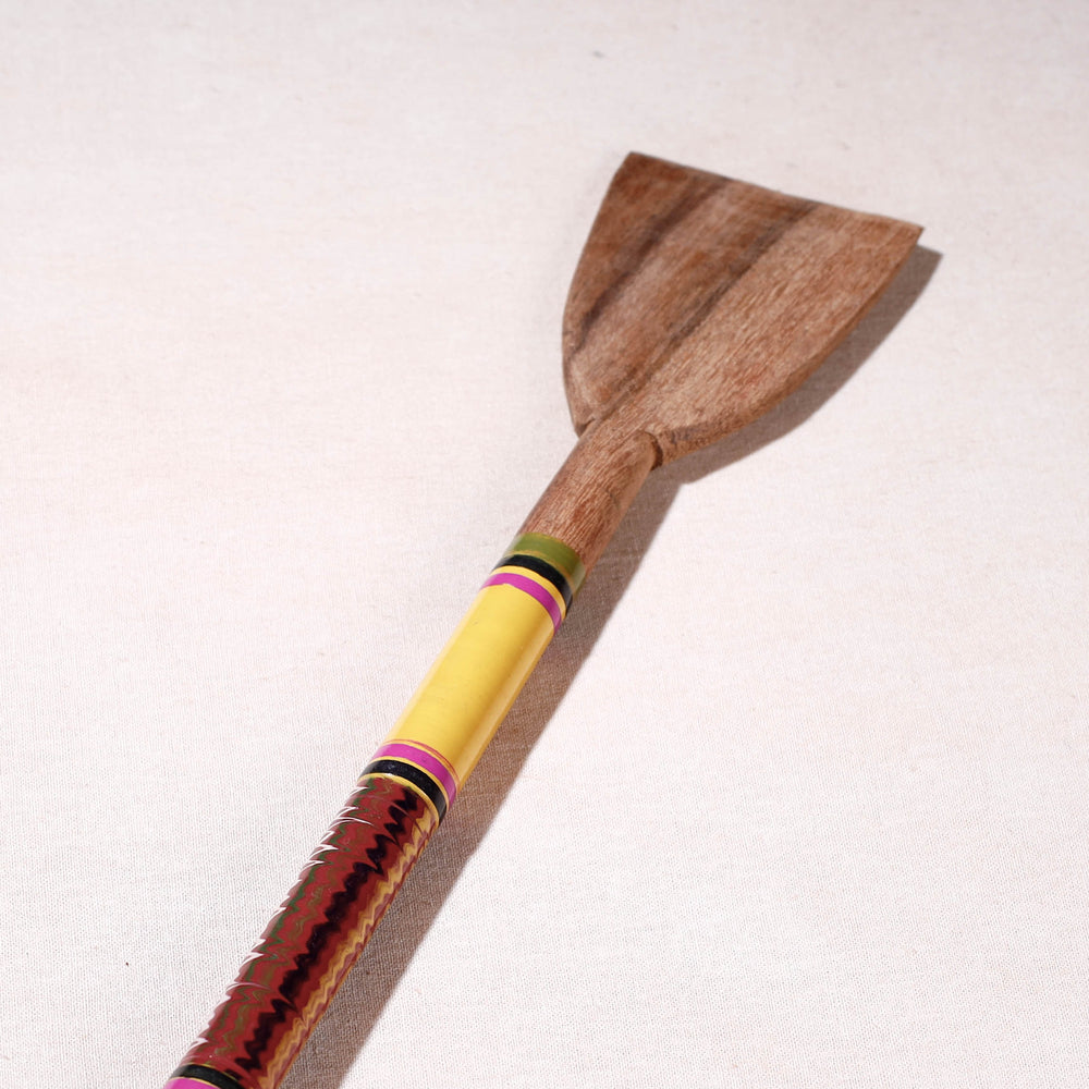 lacquered wooden spatula