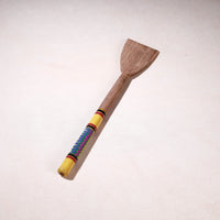 lacquered wooden spatula