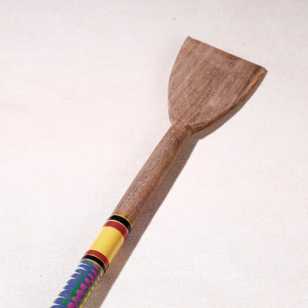 lacquered wooden spatula