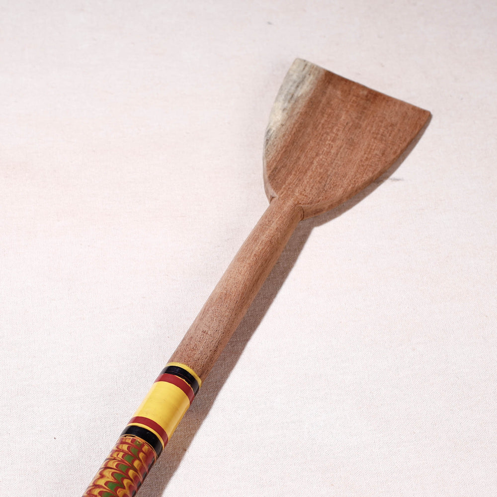 lacquered wooden spatula