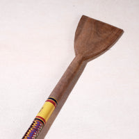 lacquered wooden spatula