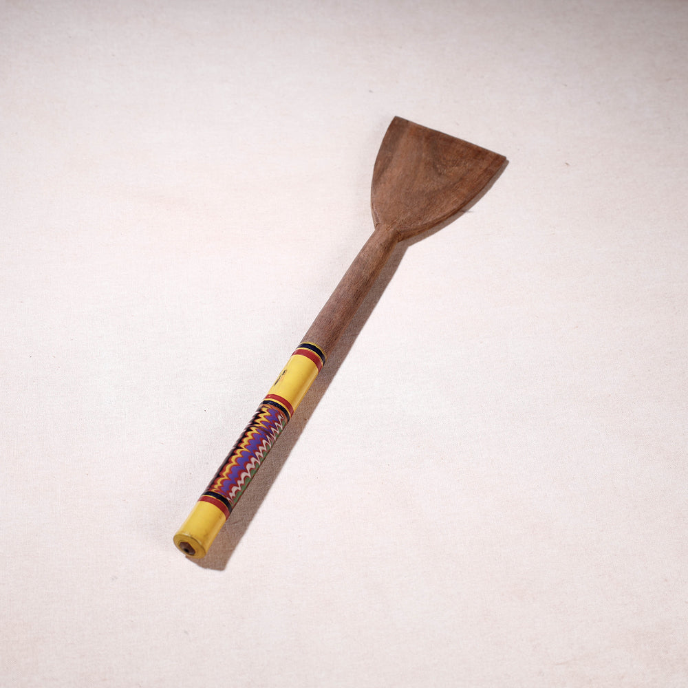 lacquered wooden spatula