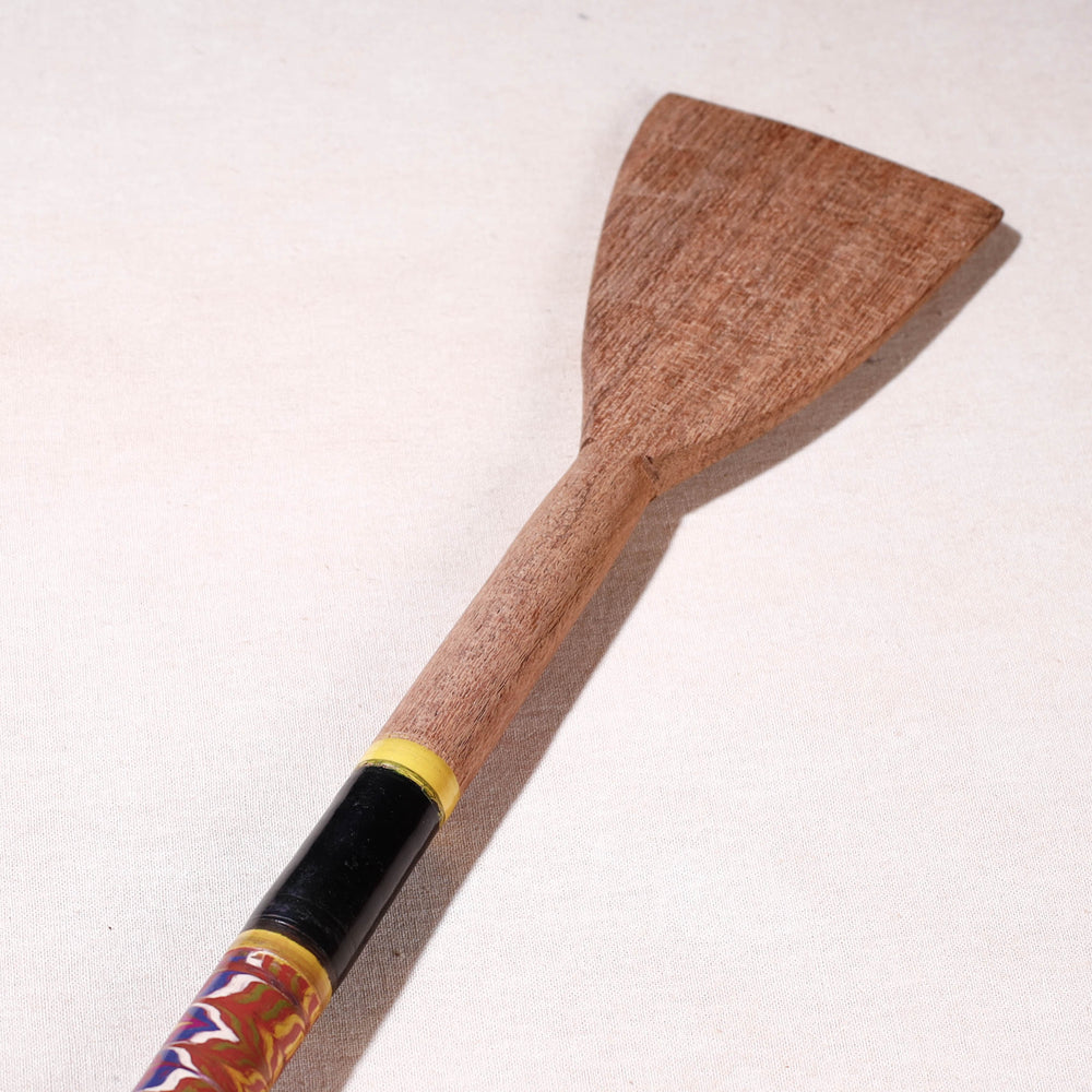 lacquered wooden spatula