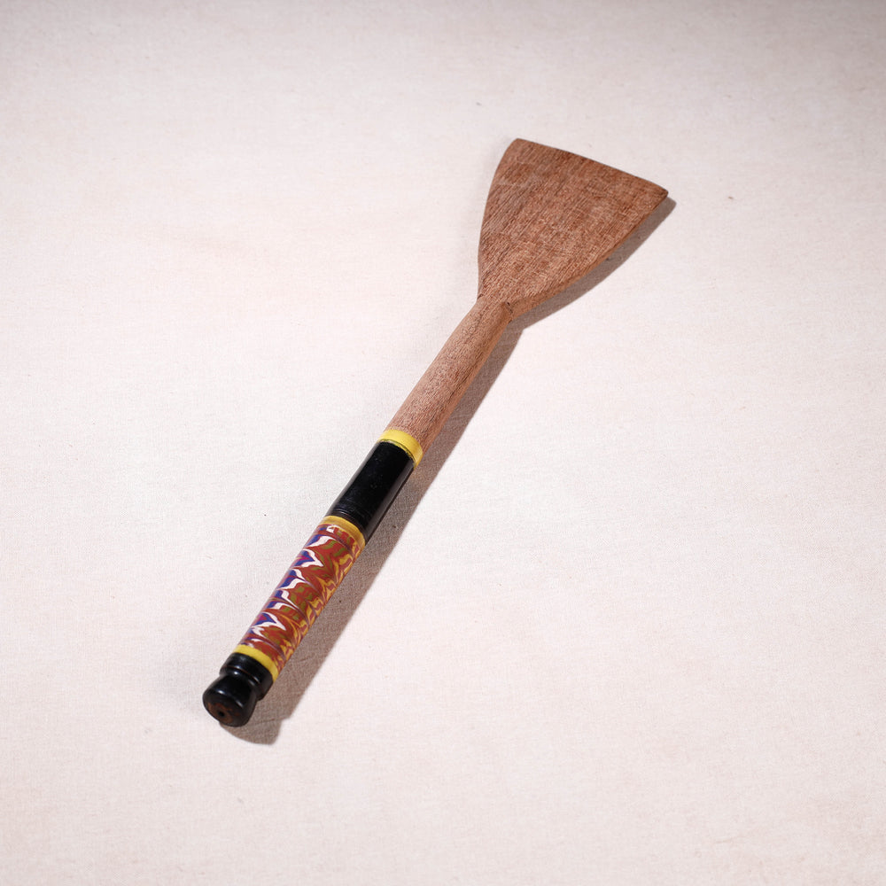 lacquered wooden spatula