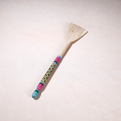 lacquered wooden spatula