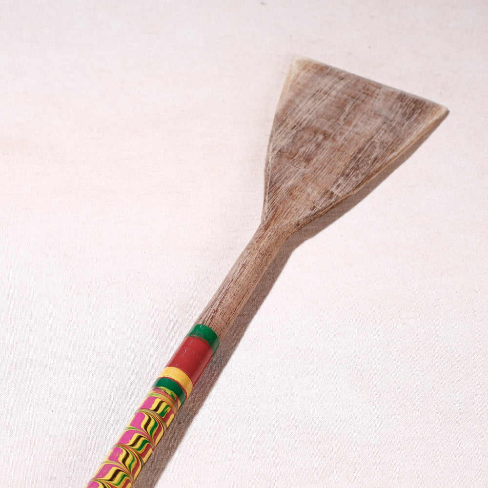 lacquered wooden spatula