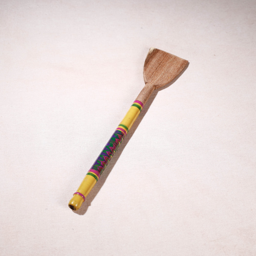 lacquered wooden spatula