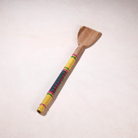 lacquered wooden spatula