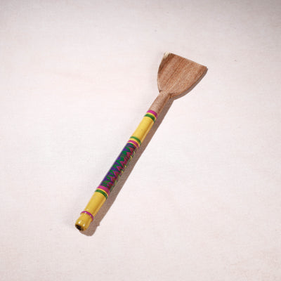 lacquered wooden spatula