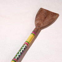 lacquered wooden spatula