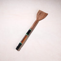 lacquered wooden spatula