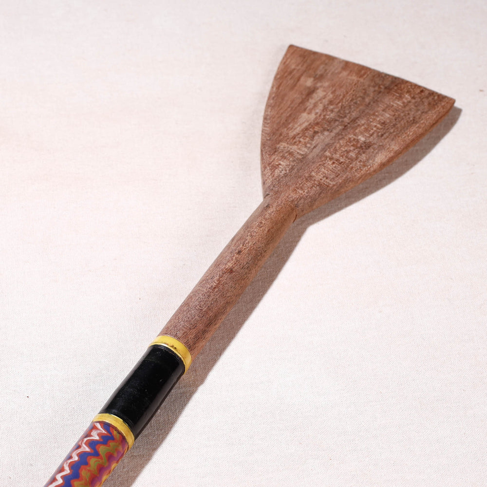 lacquered wooden spatula