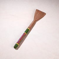 lacquered wooden spatula