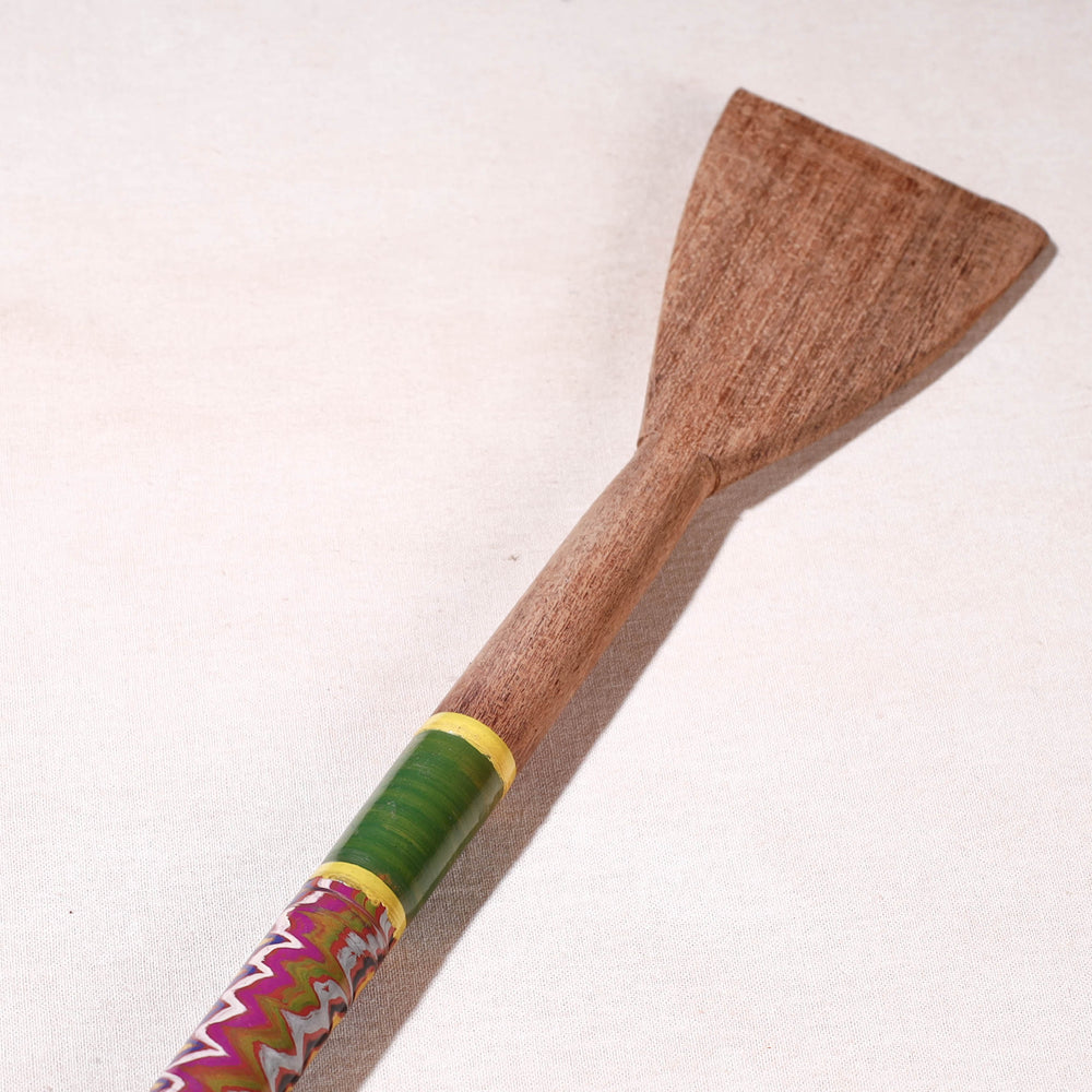 lacquered wooden spatula