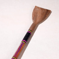 lacquered wooden spatula