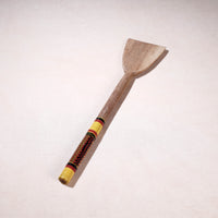 lacquered wooden spatula