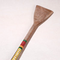 lacquered wooden spatula