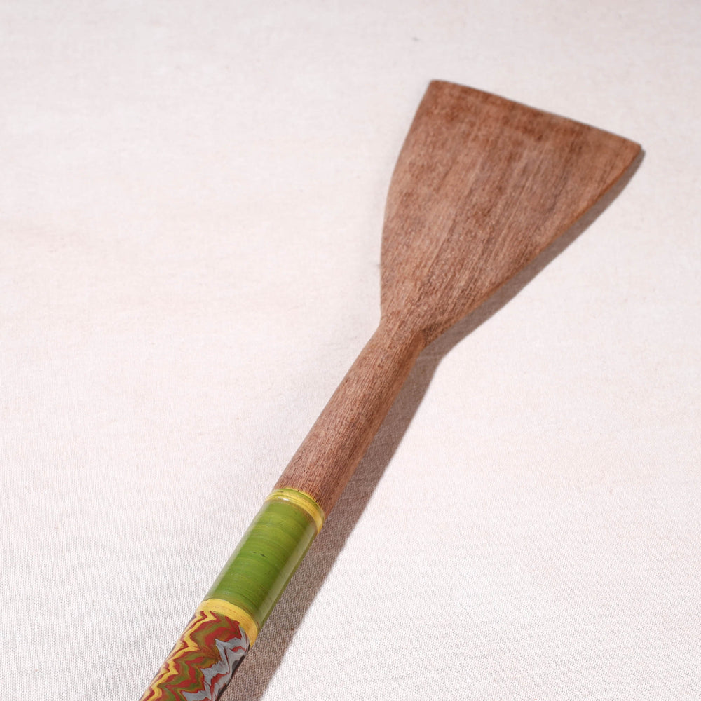 lacquered wooden spatula