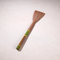 lacquered wooden spatula