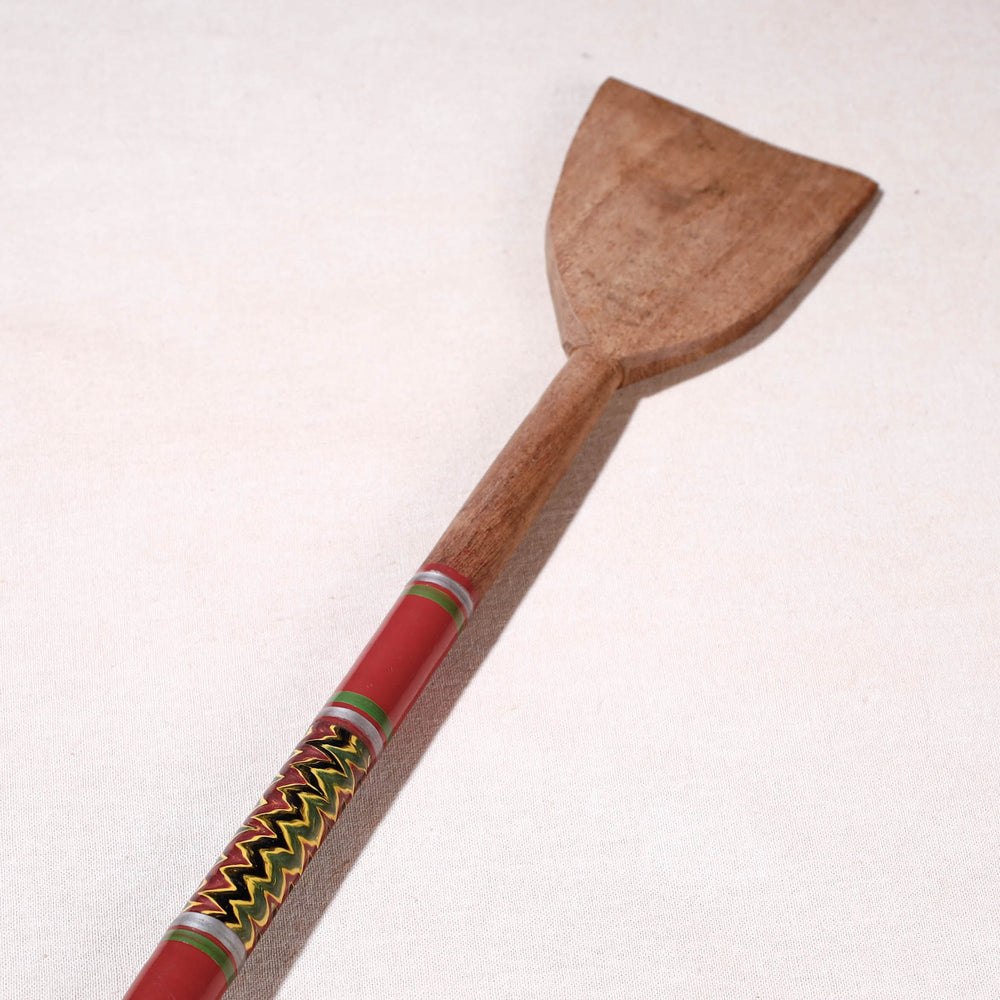 lacquered wooden spatula