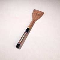 lacquered wooden spatula