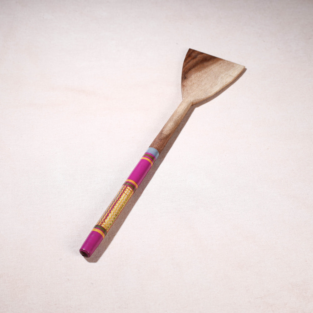 lacquered wooden spatula