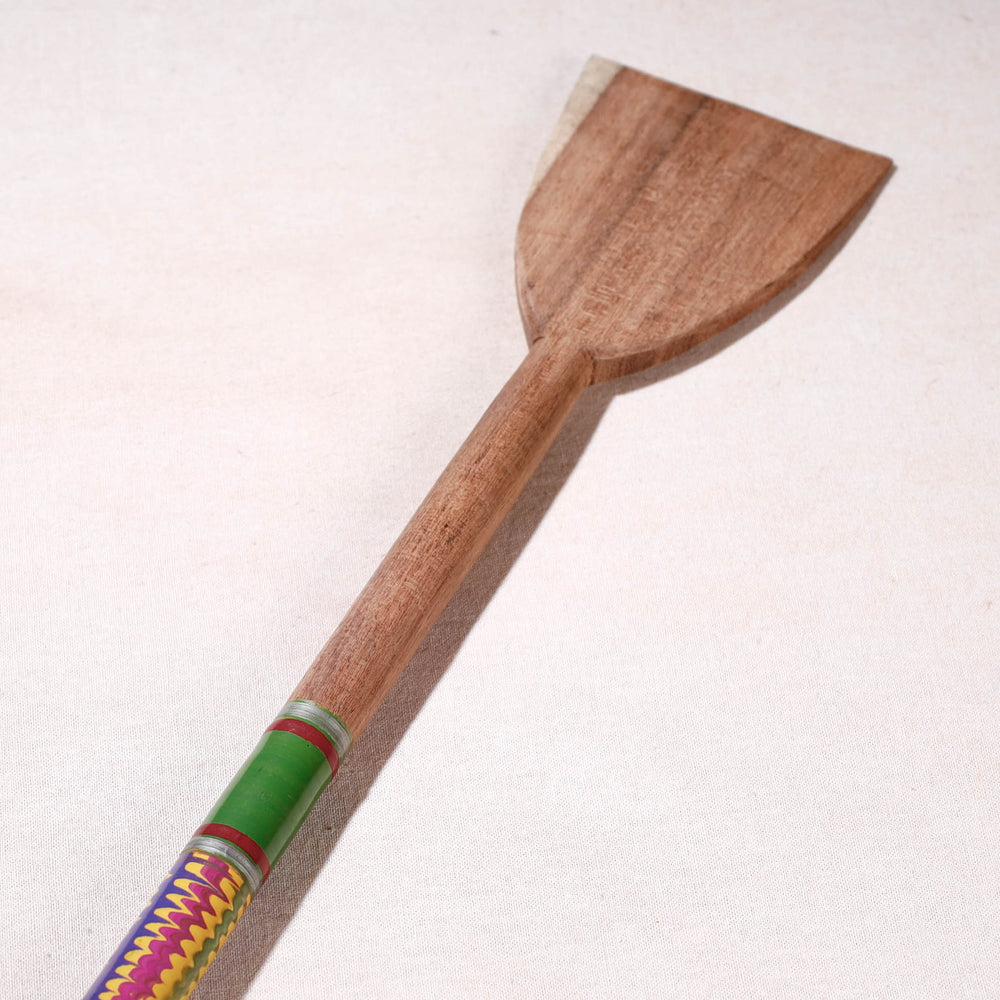 lacquered wooden spatula