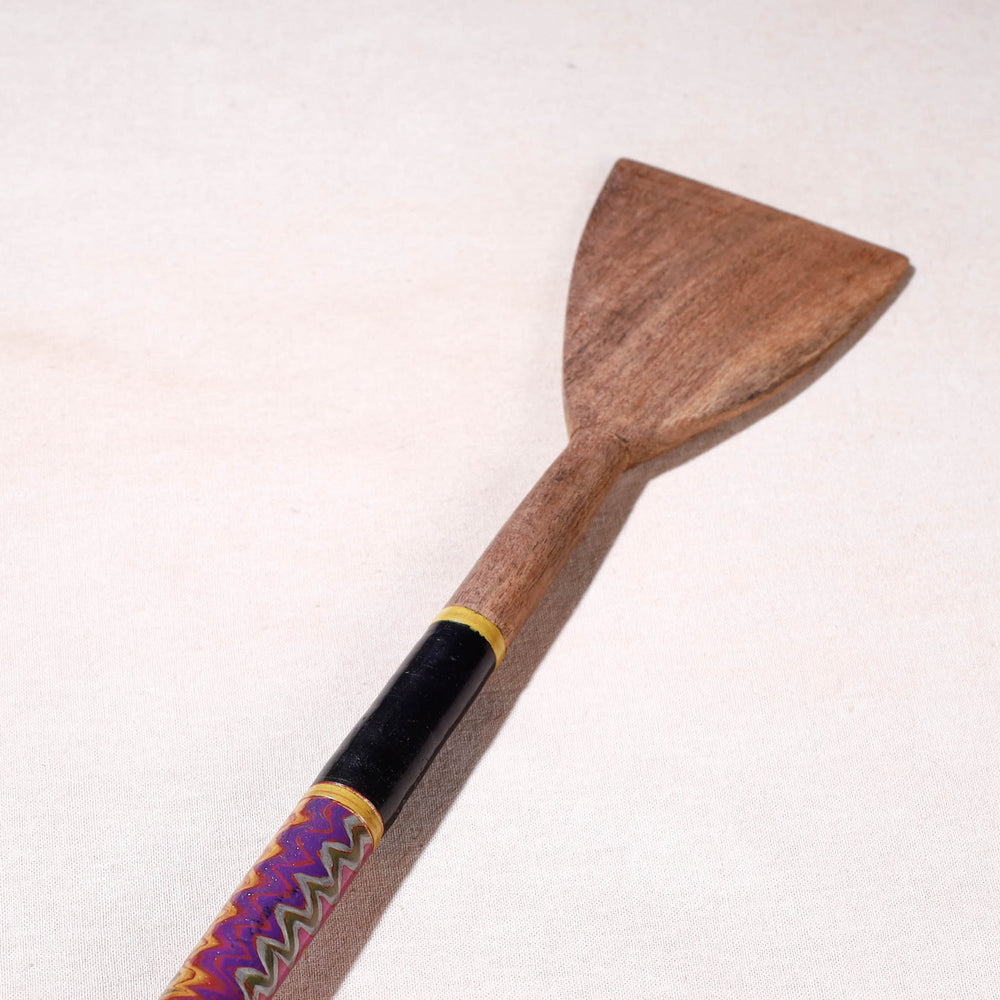 lacquered wooden spatula