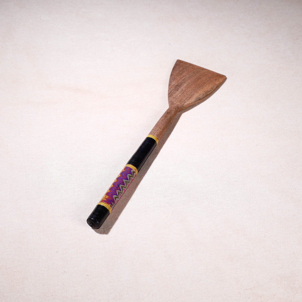 lacquered wooden spatula