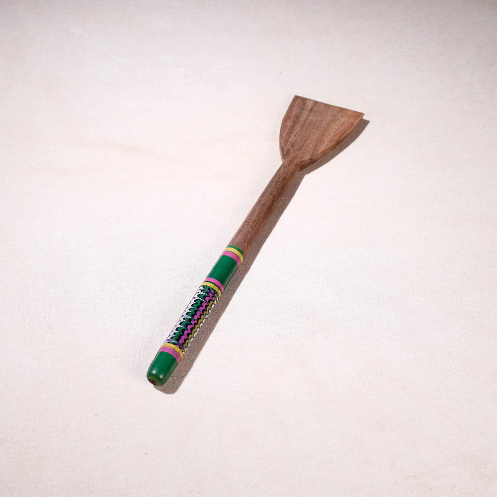 lacquered wooden spatula