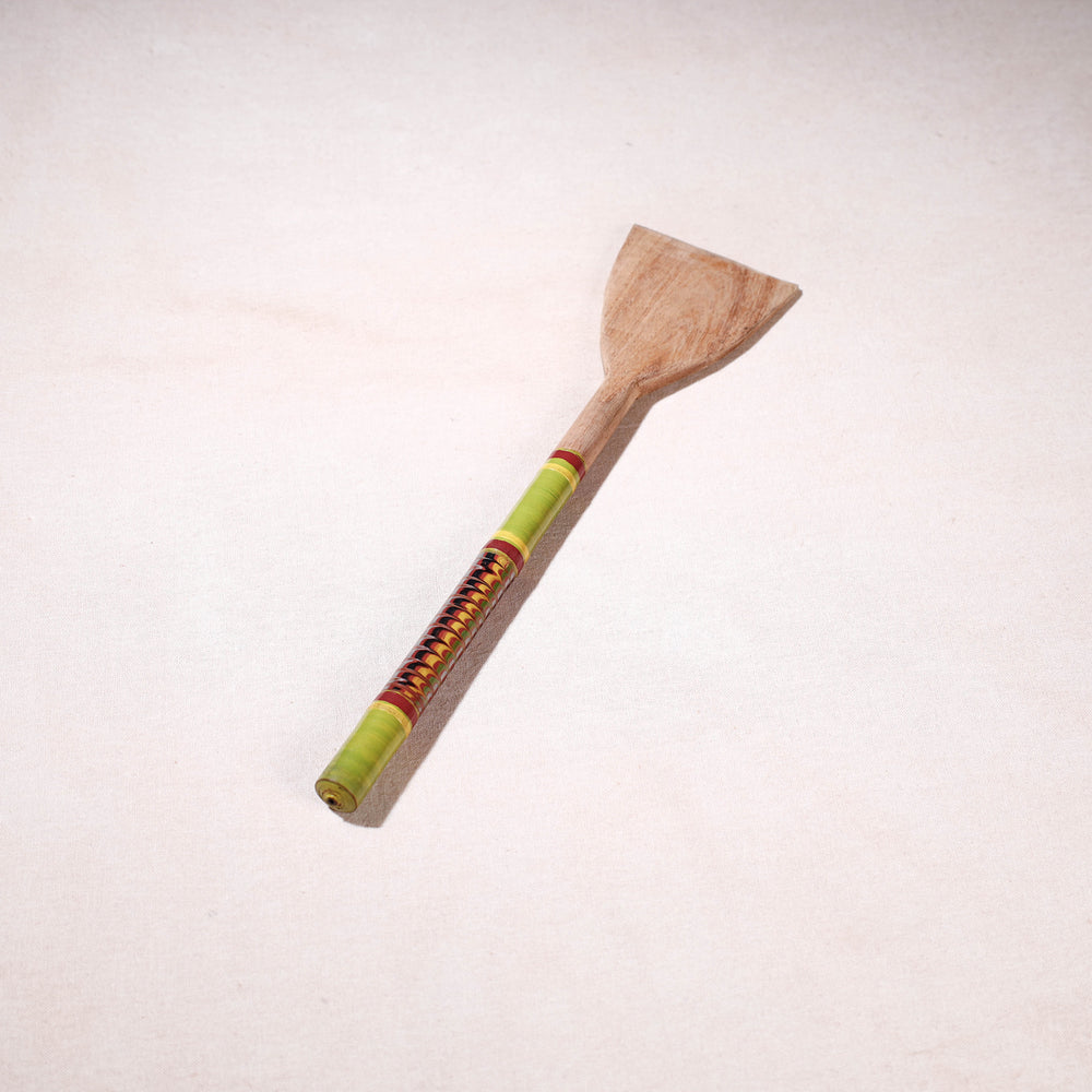 lacquered wooden spatula