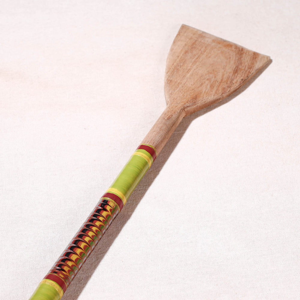 lacquered wooden spatula