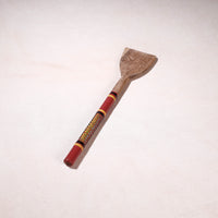 lacquered wooden spatula