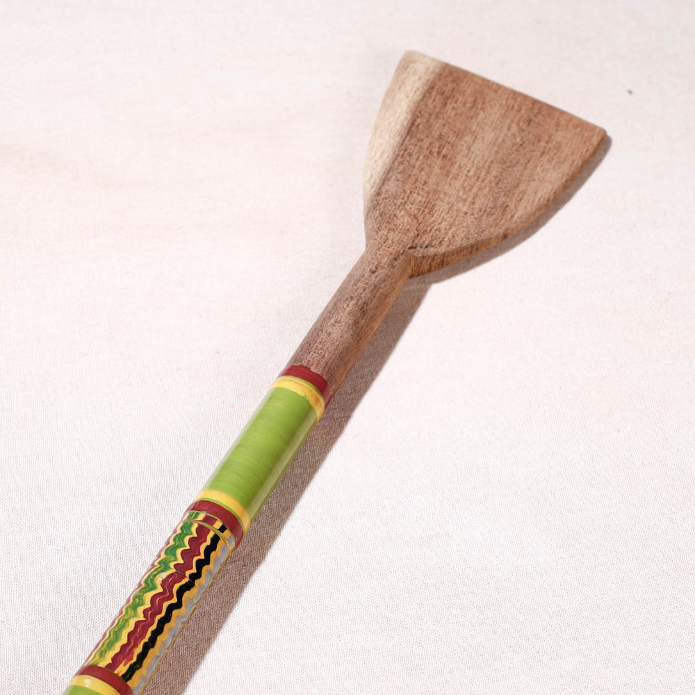 lacquered wooden spatula