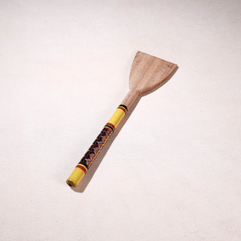 lacquered wooden spatula