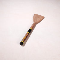 lacquered wooden spatula