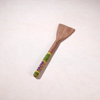 lacquered wooden spatula