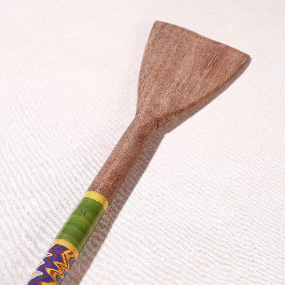 lacquered wooden spatula