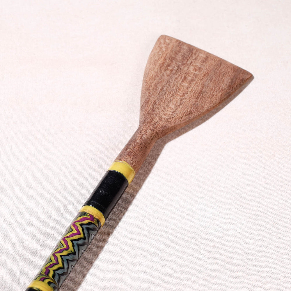 lacquered wooden spatula