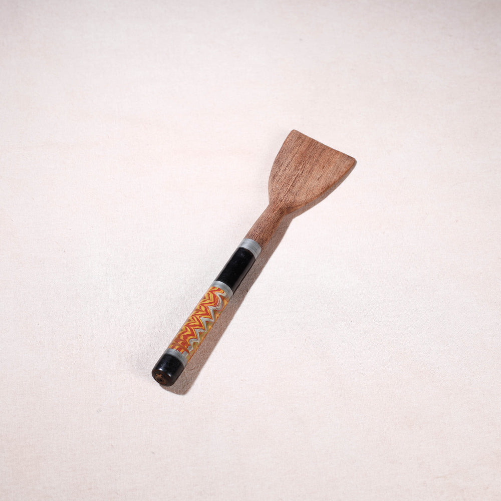 lacquered wooden spatula